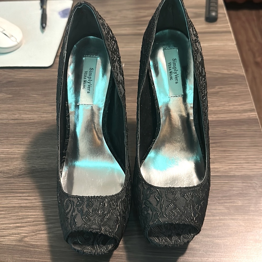 Detail Formal or semi formal high heels..  Never worn.